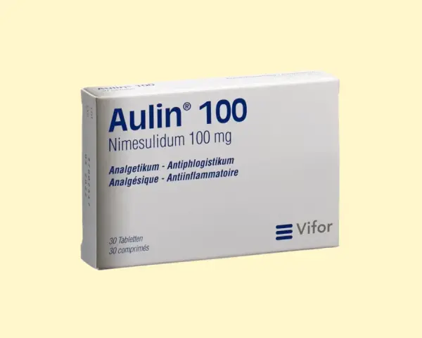Opakowanie Aulin 100 mg z nimesulidem. Informacje o tym, jak długo działa Aulin, znajdują się w ulotce.