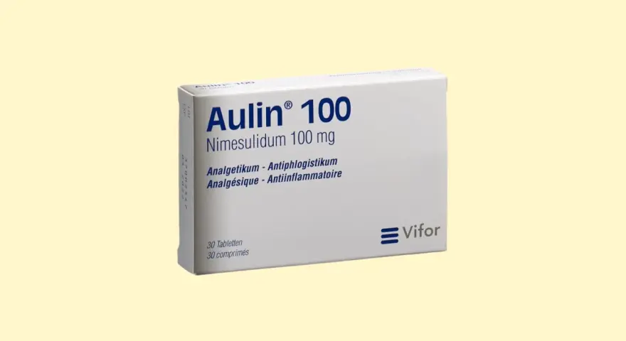 Opakowanie Aulin 100 mg z nimesulidem. Informacje o tym, jak długo działa Aulin, znajdują się w ulotce.